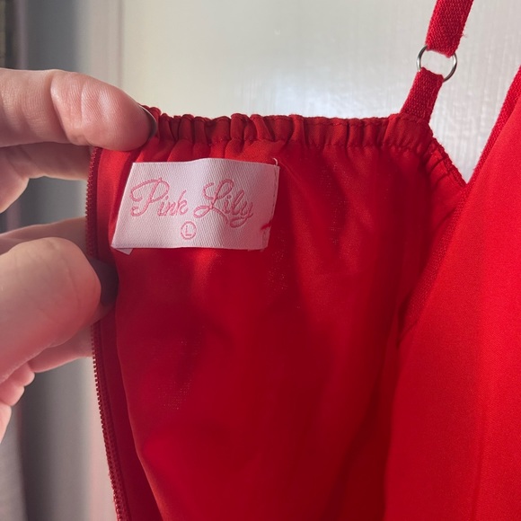 Incredible Timing Red Ruffle Wrap Romper from online Boutique Pink Lily - Picture 2 of 2